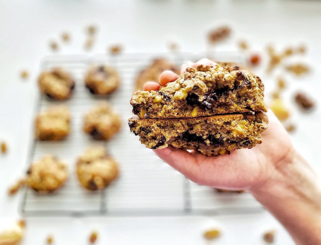 Misugaru Chocolate Chip Walnut Cookie - split in half and held in hand