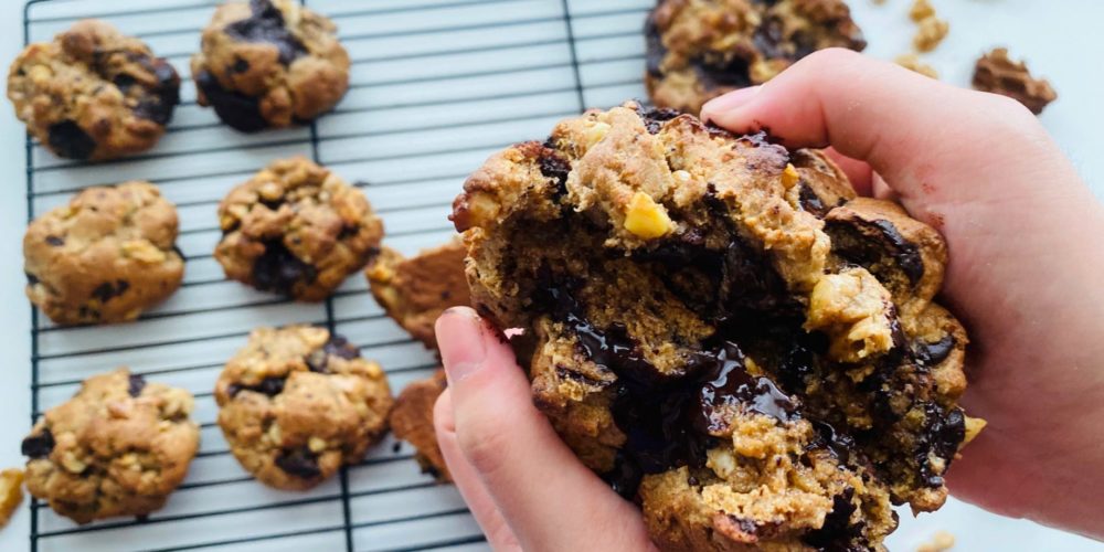 misugaru walnut chocolate chip cookie being split in half
